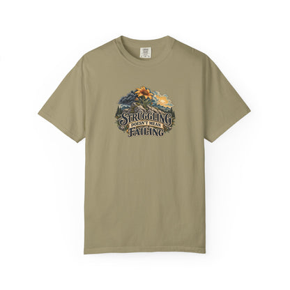 "Struggling Doesn't Mean Failing" Illustrated Edition Unisex T-Shirt — Vintage Wildflower & Clearing-Storm Illustration | Uplifted By Design™ Mental Health & Emotional Wellbeing Tee