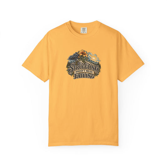 "Struggling Doesn't Mean Failing" Illustrated Edition Unisex T-Shirt — Vintage Wildflower & Clearing-Storm Illustration | Uplifted By Design™ Mental Health & Emotional Wellbeing Tee