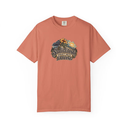 "Struggling Doesn't Mean Failing" Illustrated Edition Unisex T-Shirt — Vintage Wildflower & Clearing-Storm Illustration | Uplifted By Design™ Mental Health & Emotional Wellbeing Tee