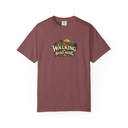 "Walking on Hard Mode" Illustrated Edition Unisex T-Shirt — Vintage Trail & Sunrise Graphic | Uplifted By Design™ Cerebral Palsy & Adaptive Movement Tee