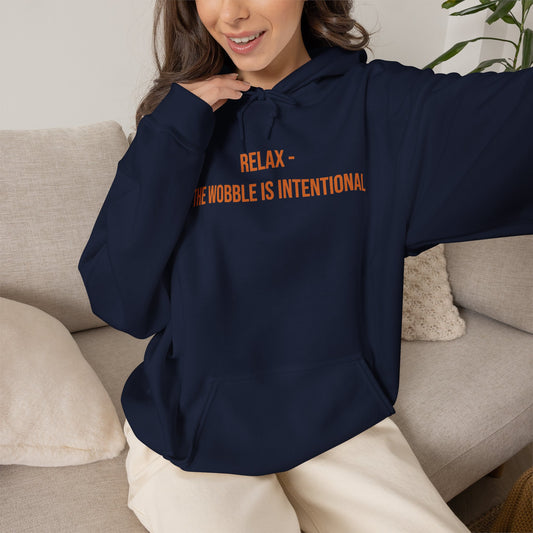 "Relax — The Wobble Is Intentional" Unisex Hoodie — Bold Gold Lettering | Uplifted By Design™ Cerebral Palsy & Adaptive Movement Hoodie