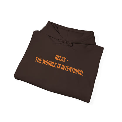 "Relax — The Wobble Is Intentional" Unisex Hoodie — Bold Gold Lettering | Uplifted By Design™ Cerebral Palsy & Adaptive Movement Hoodie