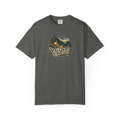 "Still Counts on Hard Days" Illustrated Edition Unisex T-Shirt — Vintage Lantern & Winding Forest Path | Uplifted By Design™ Mental Health & Emotional Wellbeing Tee
