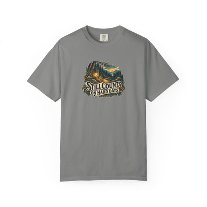 "Still Counts on Hard Days" Illustrated Edition Unisex T-Shirt — Vintage Lantern & Winding Forest Path | Uplifted By Design™ Mental Health & Emotional Wellbeing Tee