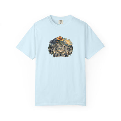 "Struggling Doesn't Mean Failing" Illustrated Edition Unisex T-Shirt — Vintage Wildflower & Clearing-Storm Illustration | Uplifted By Design™ Mental Health & Emotional Wellbeing Tee