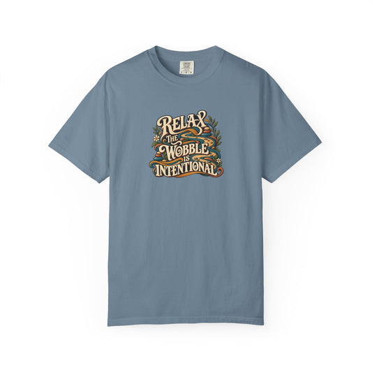 "Relax the Wobble Is Intentional" Illustrated Edition Unisex T-Shirt — Retro Motion Ribbon & Botanical Graphic | Uplifted By Design™ Cerebral Palsy & Adaptive Movement Tee