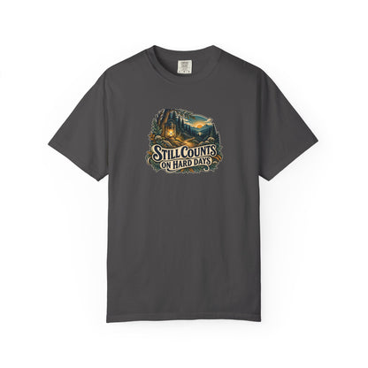 "Still Counts on Hard Days" Illustrated Edition Unisex T-Shirt — Vintage Lantern & Winding Forest Path | Uplifted By Design™ Mental Health & Emotional Wellbeing Tee