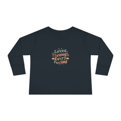 "Loved Through Every Feeling" Toddler Long Sleeve Tee — Groovy Sparkle Lettering | Uplifted By Design™ Inspirational Kids Shirt