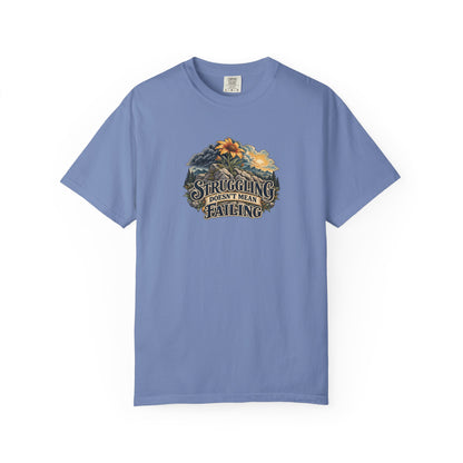 "Struggling Doesn't Mean Failing" Illustrated Edition Unisex T-Shirt — Vintage Wildflower & Clearing-Storm Illustration | Uplifted By Design™ Mental Health & Emotional Wellbeing Tee
