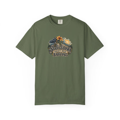 "Struggling Doesn't Mean Failing" Illustrated Edition Unisex T-Shirt — Vintage Wildflower & Clearing-Storm Illustration | Uplifted By Design™ Mental Health & Emotional Wellbeing Tee