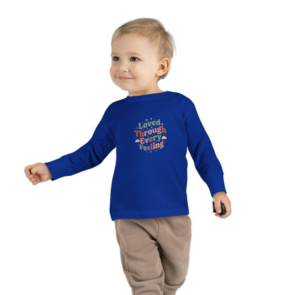 "Loved Through Every Feeling" Toddler Long Sleeve Tee — Groovy Sparkle Lettering | Uplifted By Design™ Inspirational Kids Shirt